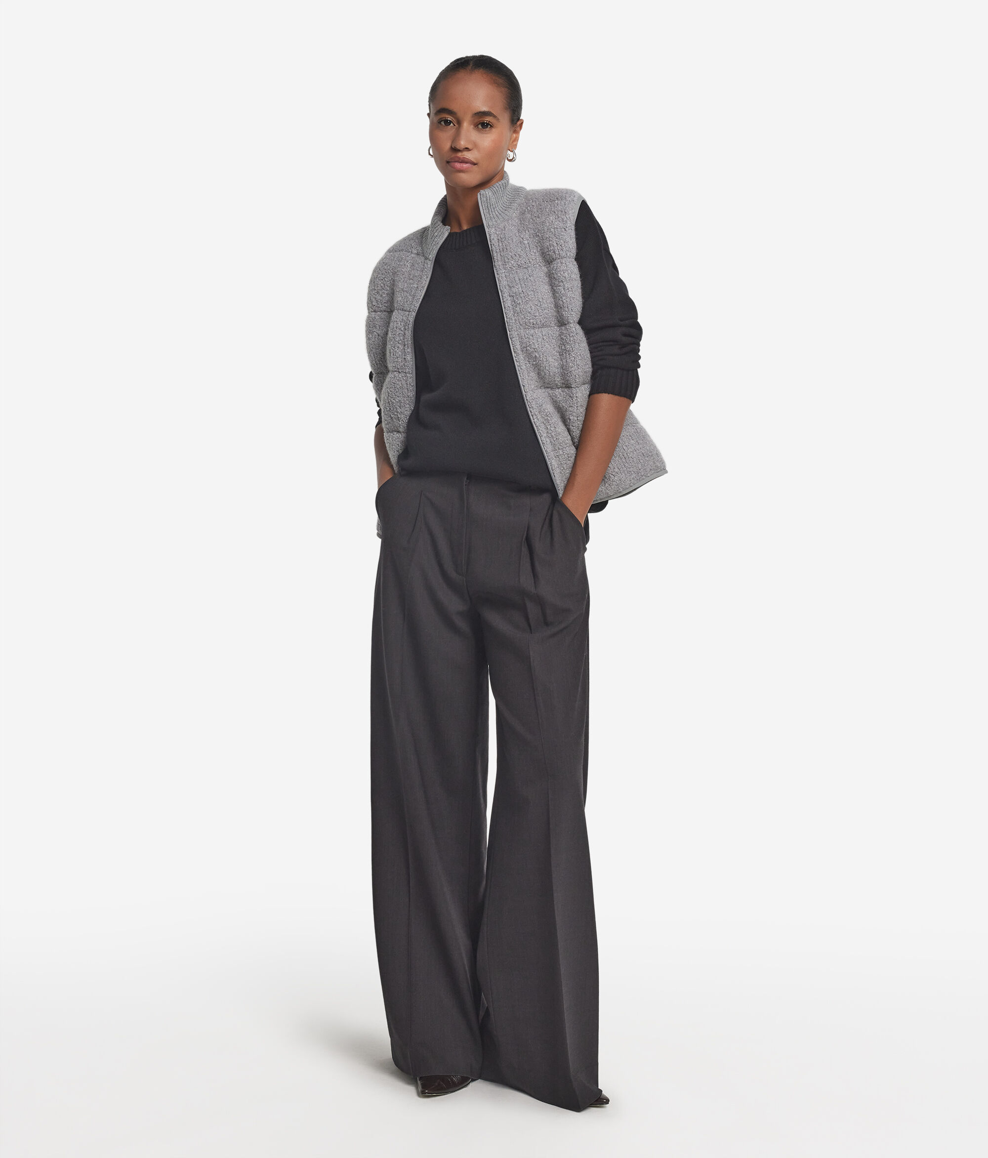 Reversible bouclé and nylon gilet